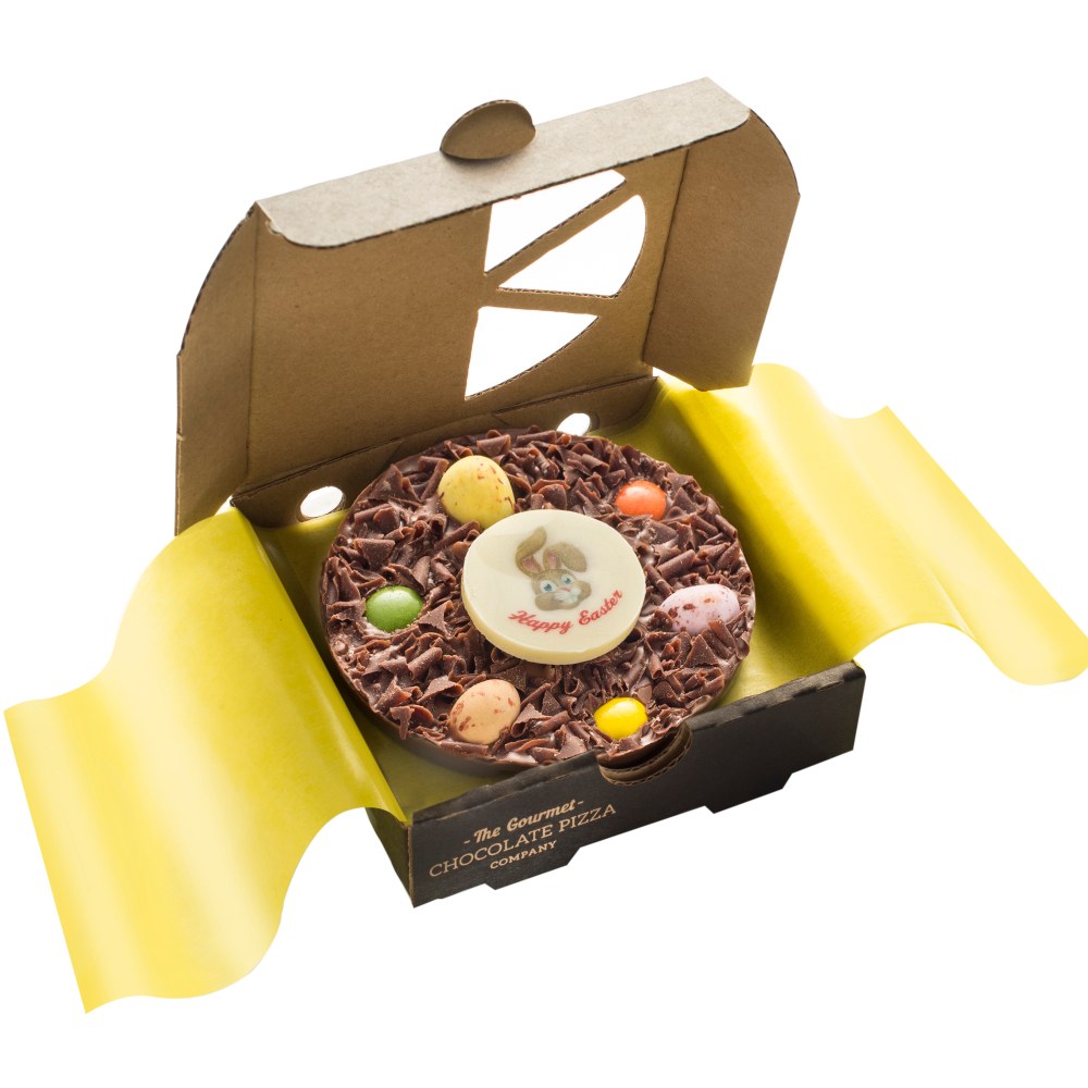 Easter Mini Chocolate Pizza with chocolate mini eggs and a white chocolate Happy Easter plaque in the centre